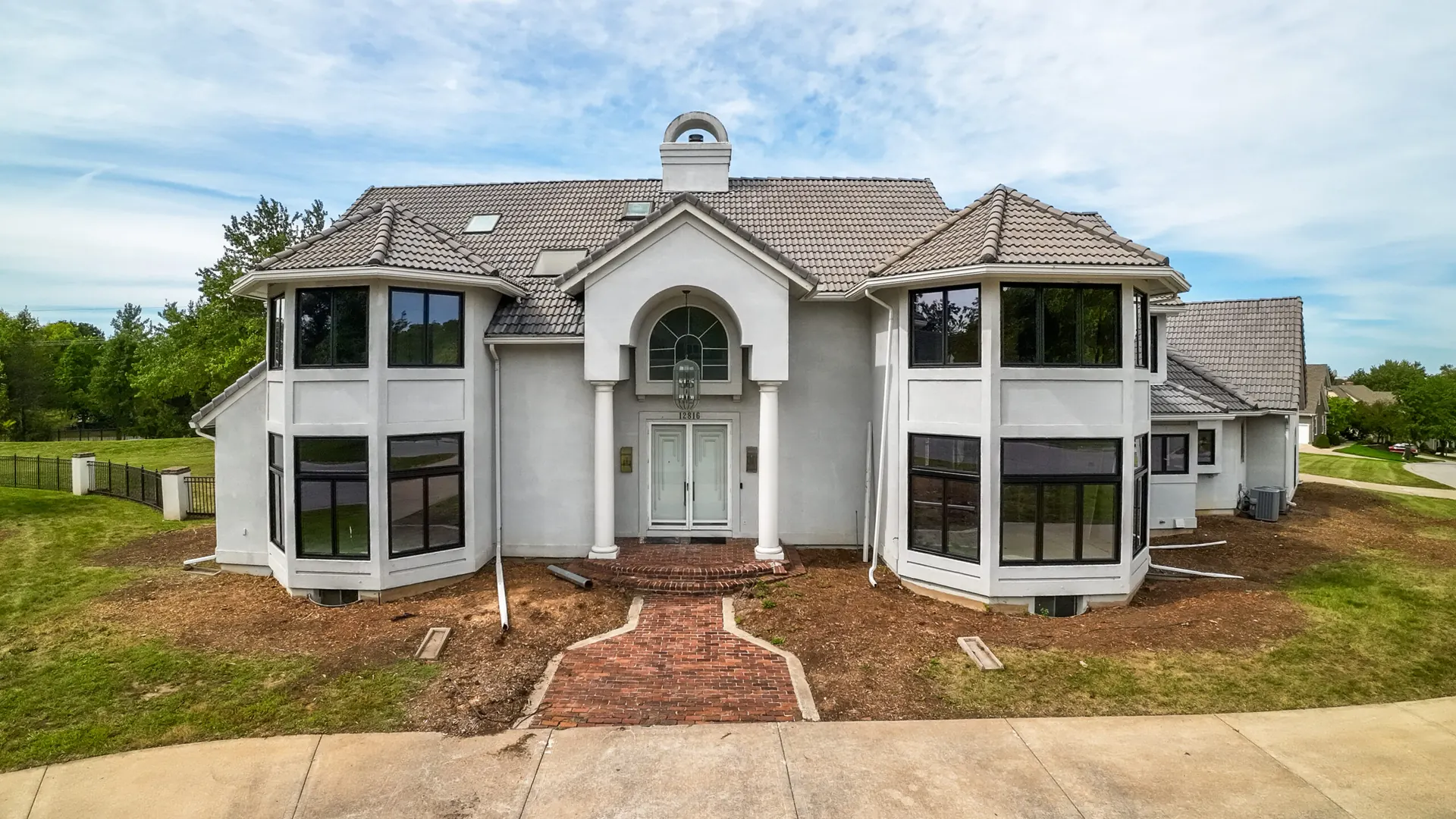 New Black Windows on White Stucco