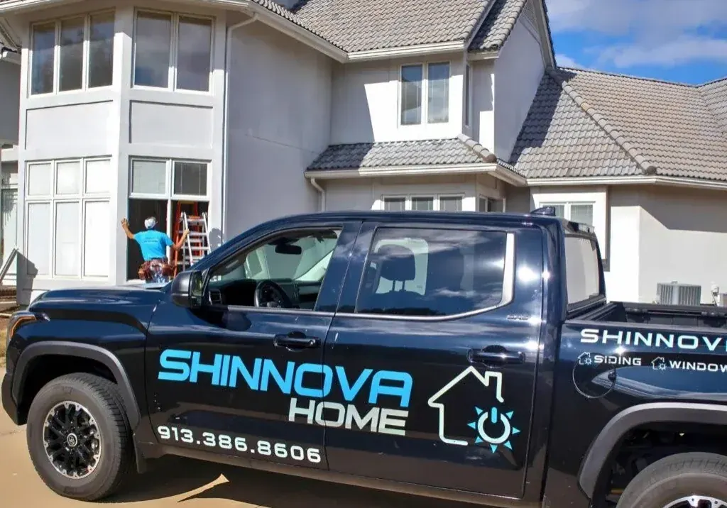 Shinnova Home installers on a roof