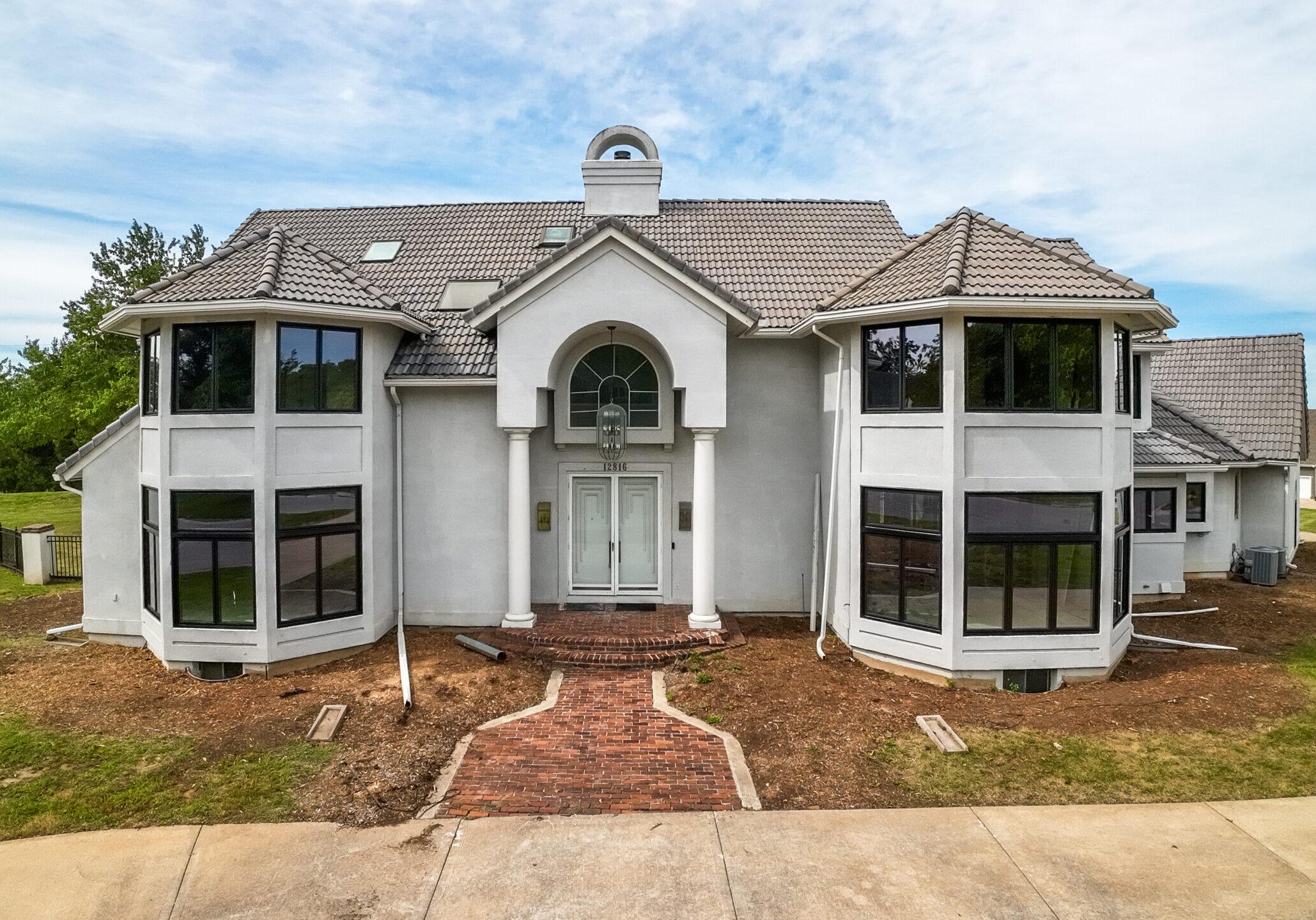 New Black Windows on White Stucco